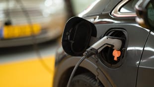 The Electric Vehicle Market Faces Challenges as It Goes Mainstream cover